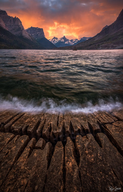 Fiery Sunset on Jagged Shores - Glacier National Park